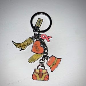 NWOT - Coach key ring silver with charms